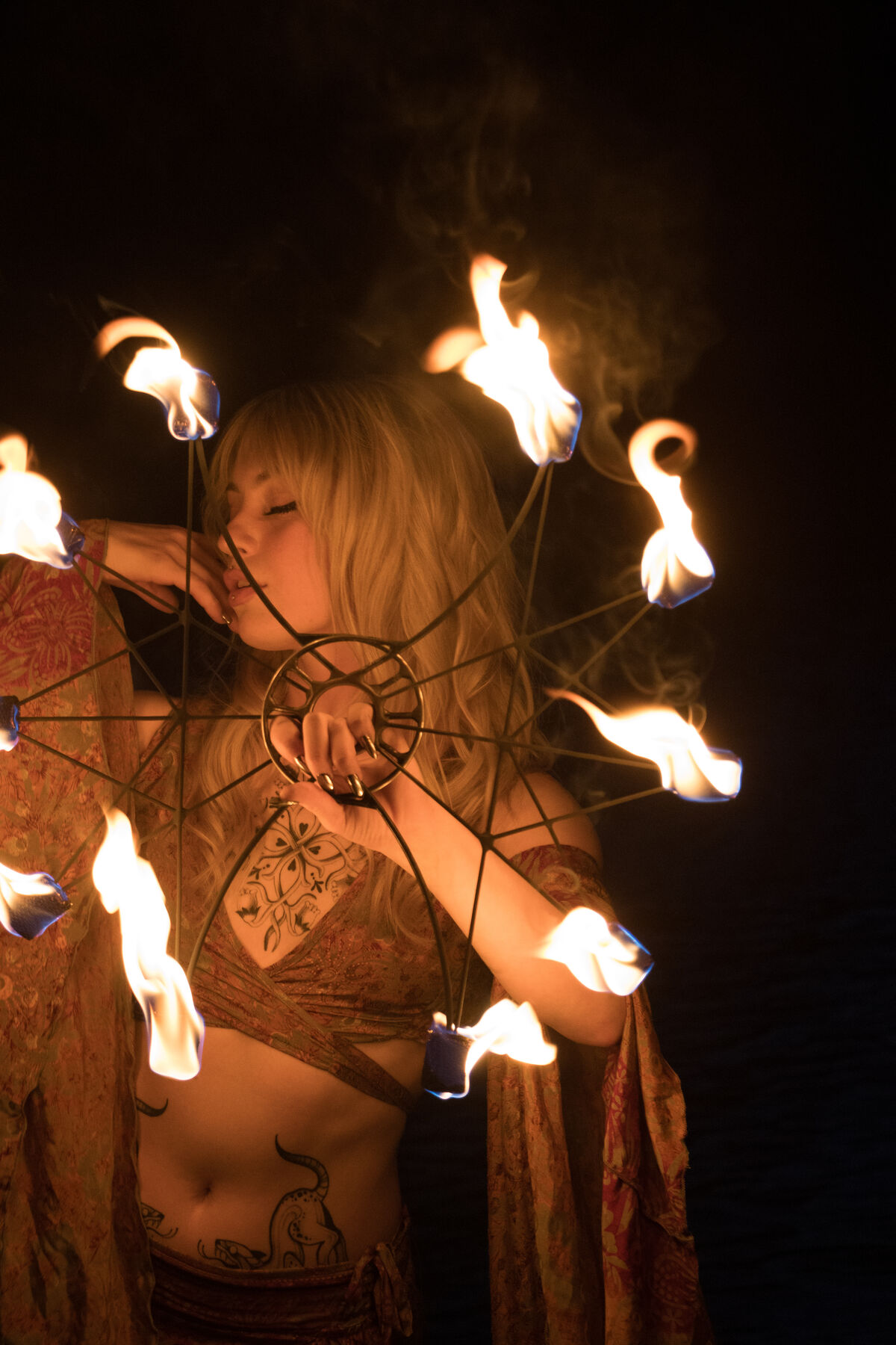 Performer framed by a ring of flames